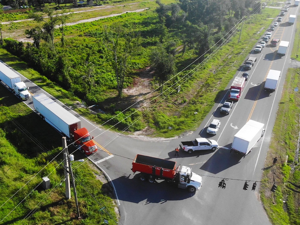 a train is parked on the side of a road