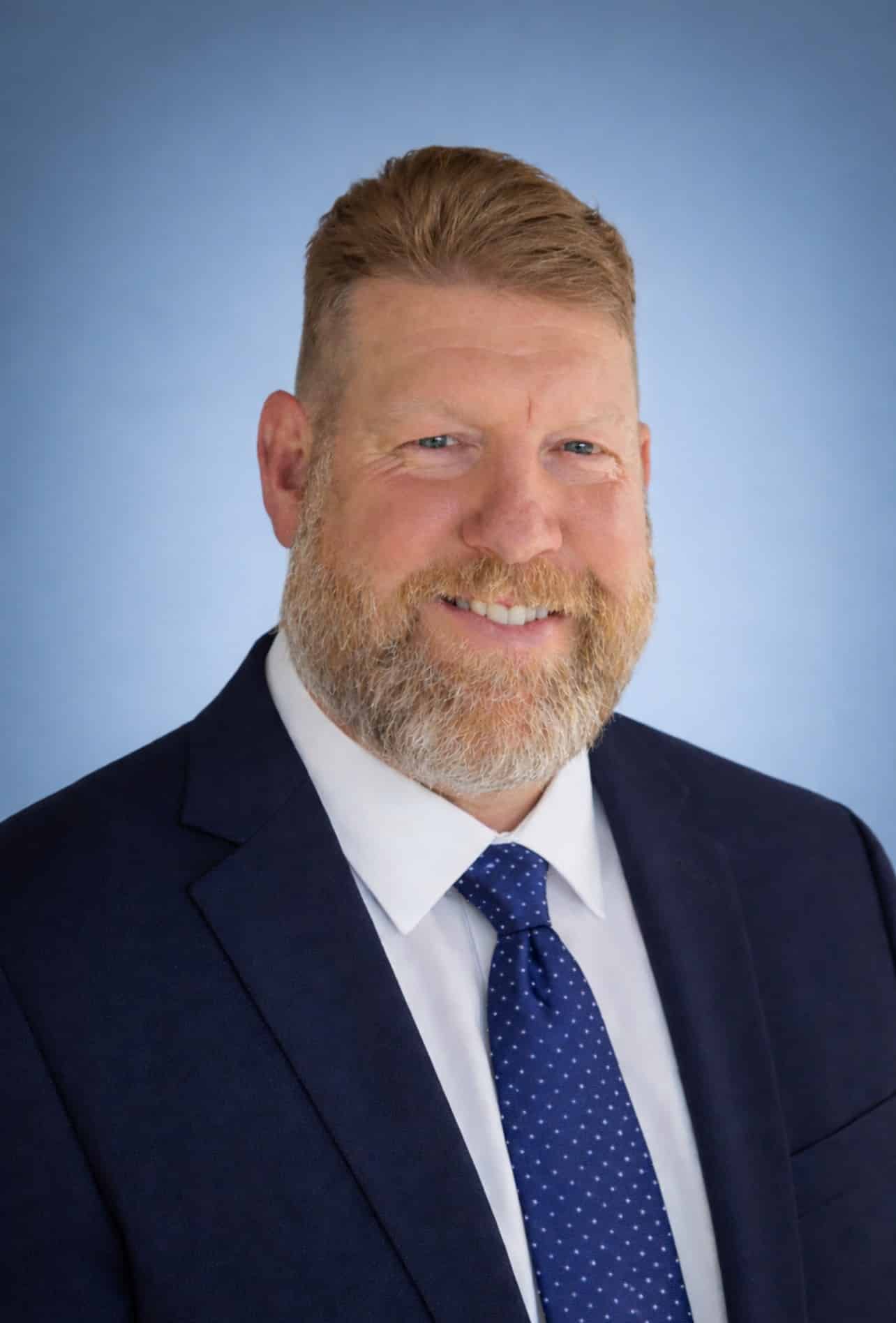 a man wearing a suit and tie