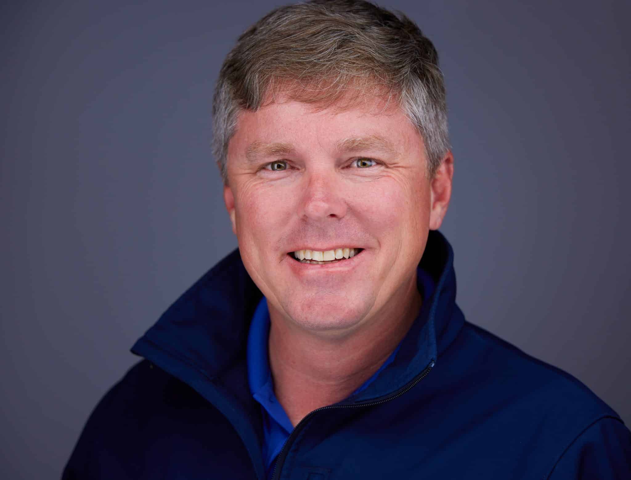 a man in a blue shirt