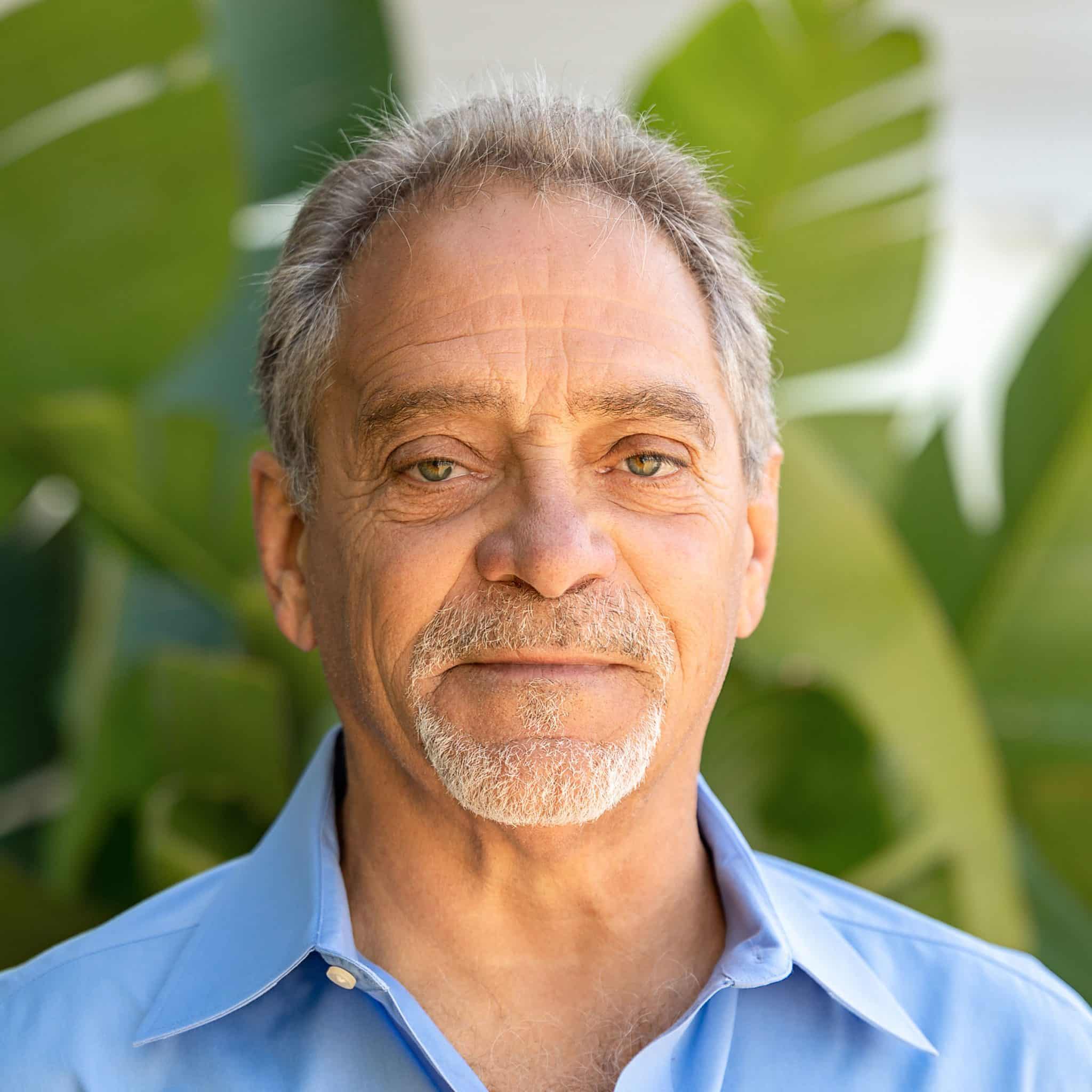 a man wearing a blue shirt