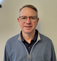 a man smiling for the camera